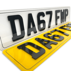 Close-up of premium road-legal 4D 3mm acrylic number plates with border in black characters on white and yellow plates, made by Official Plates Ltd