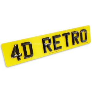 Angled view of yellow 4D number plate with 4D RETRO lettering.