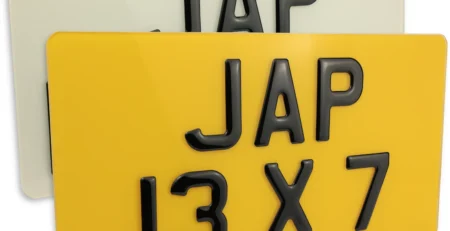 13x7 JDM import size number plates in yellow rear and white front, made by Official Plates